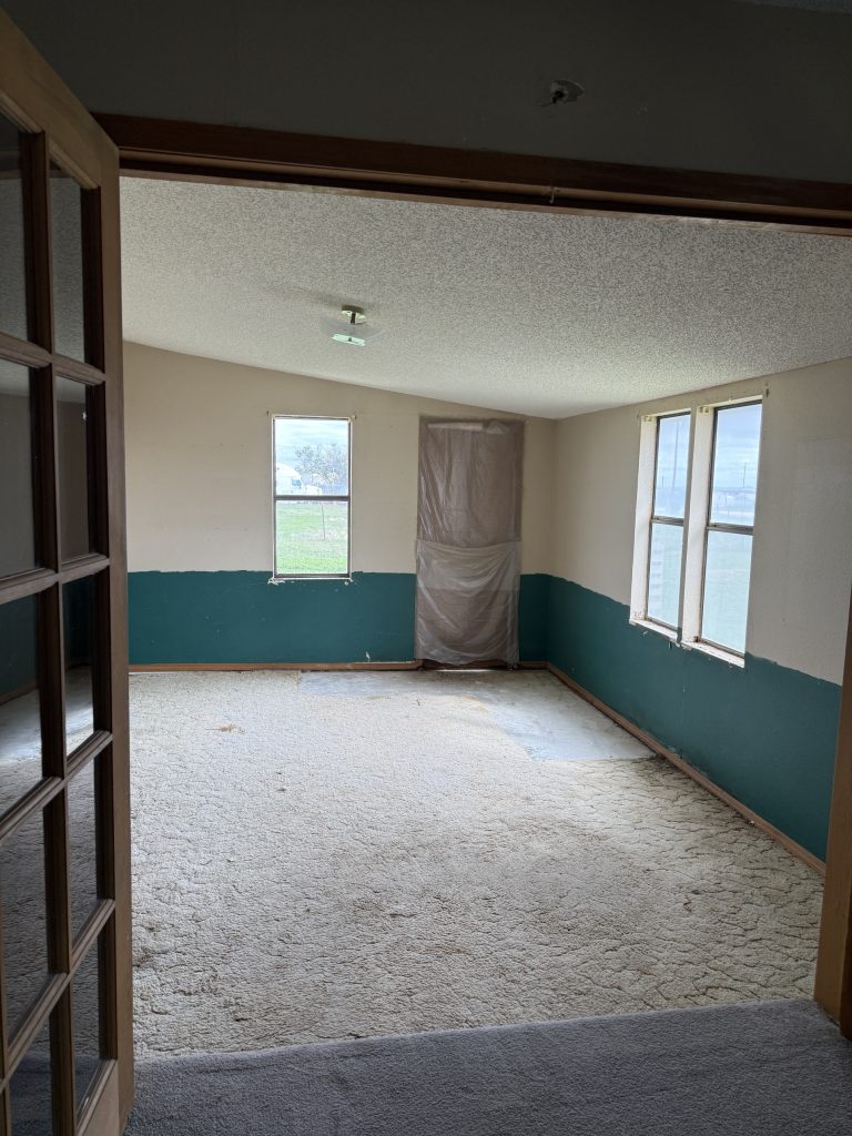 After: the same bedroom emptied and cleaned