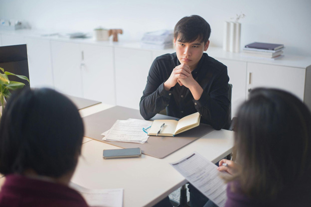 Estate paperwork reviewed during a family meeting